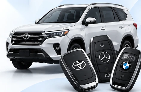 White SUV and car remote keys